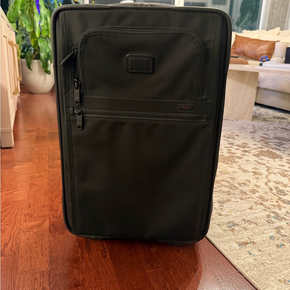Tumi Black Travel Suitcase
